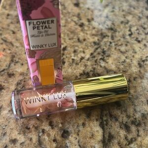 New in box! Winky Lux lip oil.